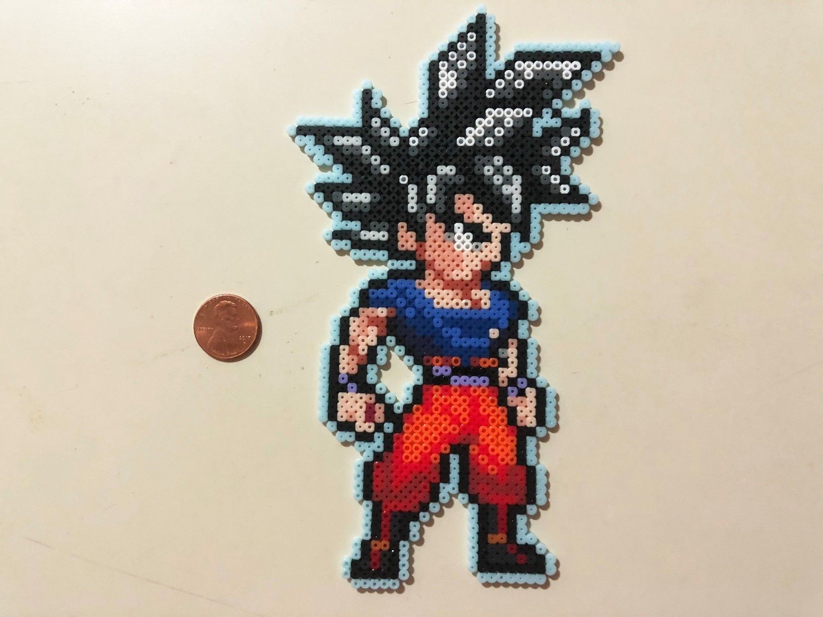 photo Goku Ultra Instinct Pixel Art https www reddit com r minecraftbuilds comments gzofs7 ultra instinct goku my first attempt at pixel art